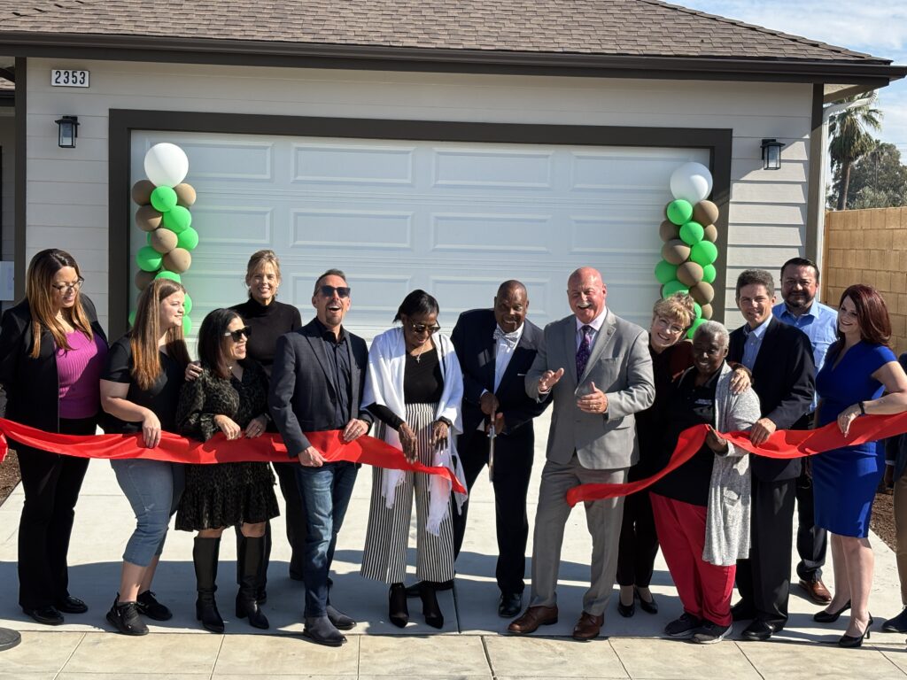 ribbon cutting at heritage estates