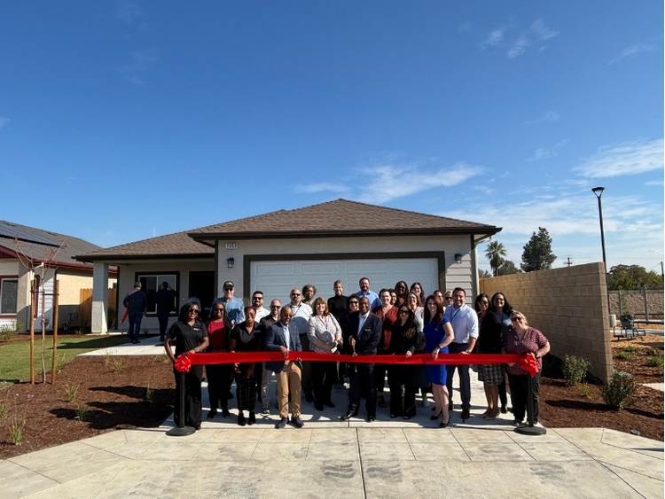 ribbon cutting at heritage estates